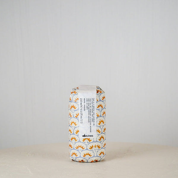 Davines hair product packaging on a neutral background