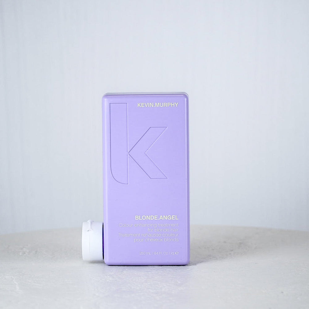 Purple container with a brand logo on a white surface and light gray background