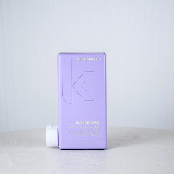 Purple container with a brand logo on a white surface and light gray background