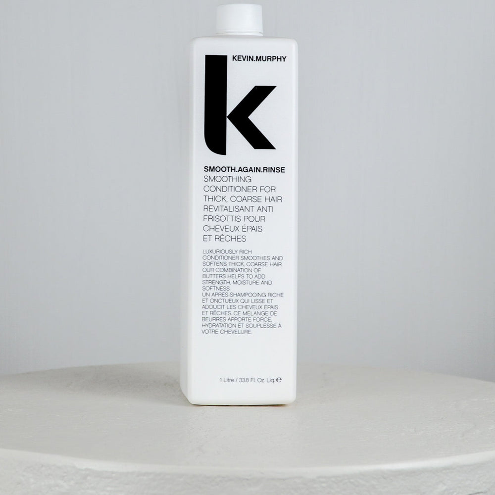 Kevin Murphy Smooth Again Rinse conditioner bottle on a white background