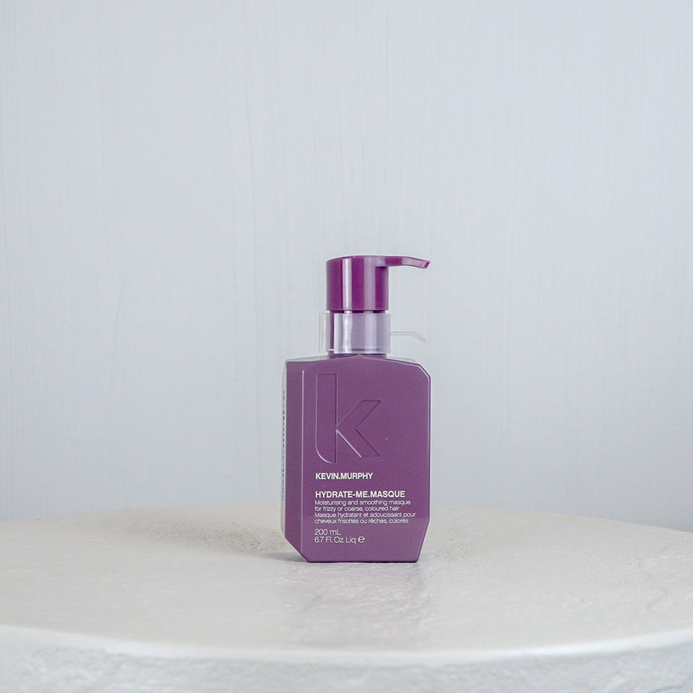 Purple tube of Kiehl's cream on a white background