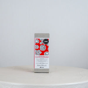 Dove soap bar on a white surface with a gray background