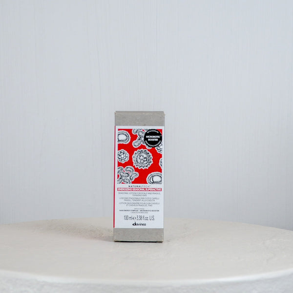 Dove soap bar on a white surface with a gray background