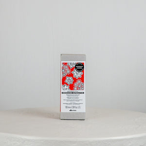 Dove soap bar on a white surface with a gray background