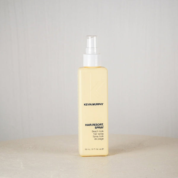 Kevin Murphy hair product bottle on a neutral background