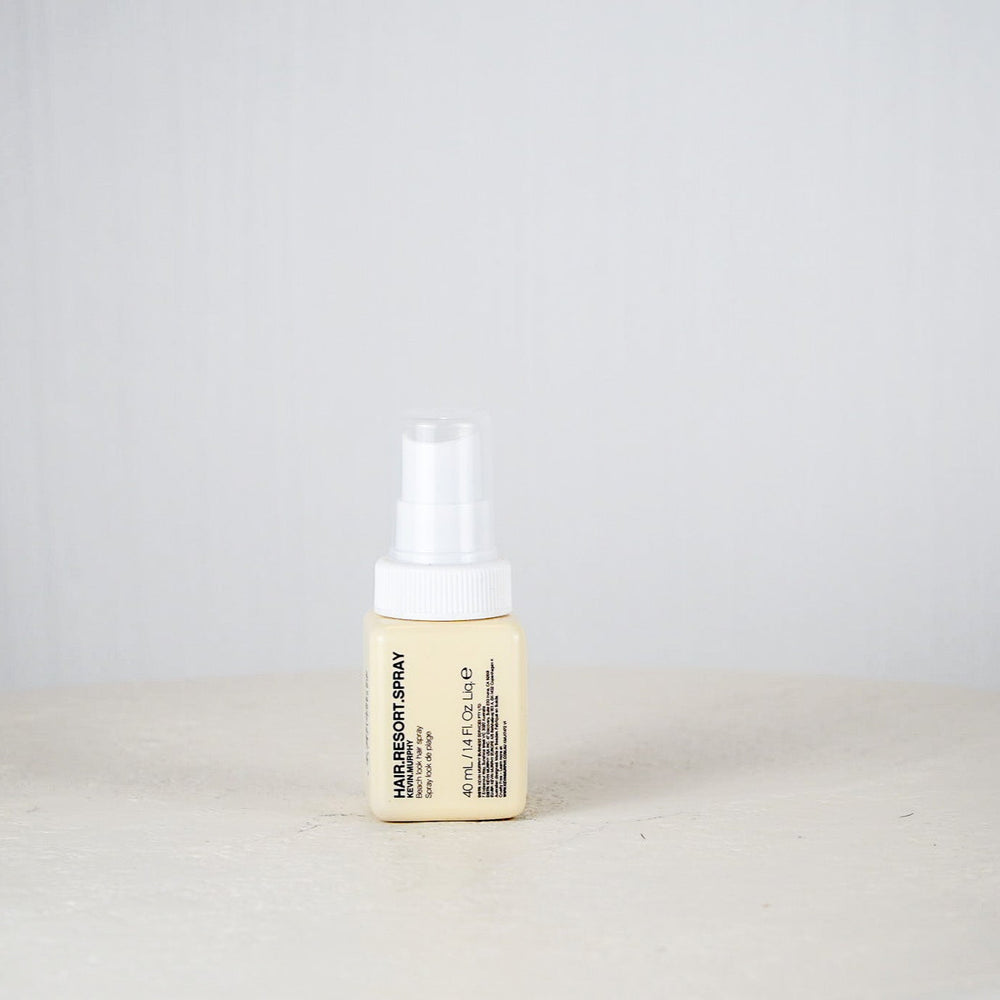 Kevin Murphy hair product bottle on a neutral background