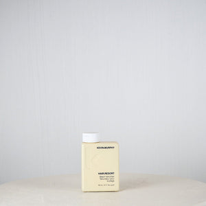 Kevin Murphy hair product box on a white surface with a light gray background