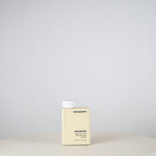 Kevin Murphy hair product box on a white surface with a light gray background