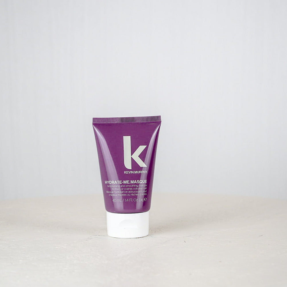 Purple tube of Kiehl's cream on a white background