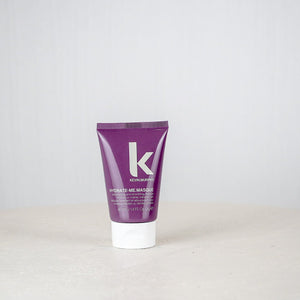 Purple tube of Kiehl's cream on a white background