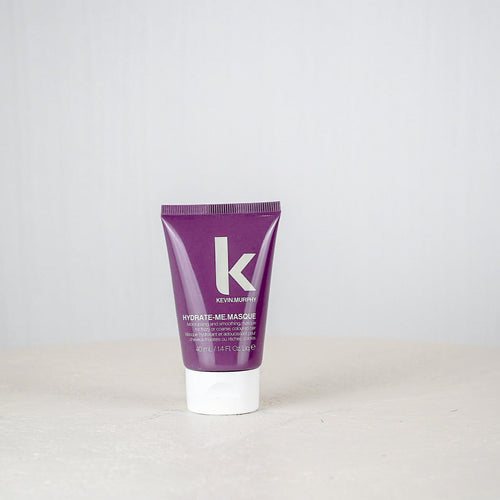 Purple tube of Kiehl's cream on a white background