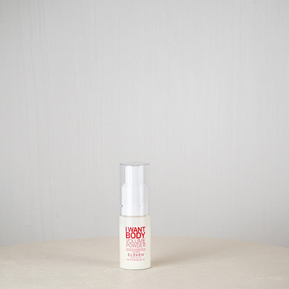 Skincare bottle labeled 'I Want Body' on a neutral background
