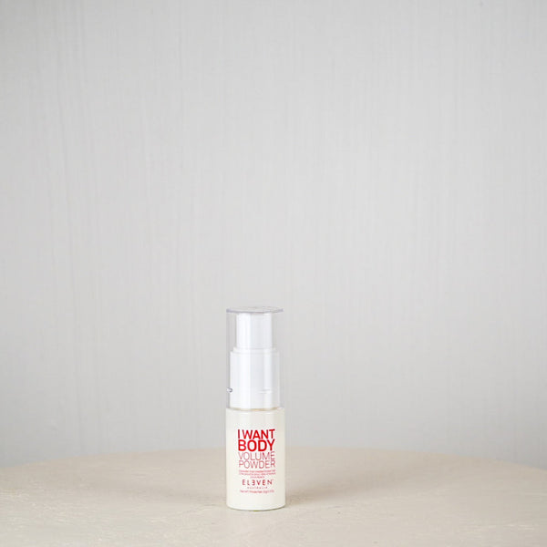 Skincare bottle labeled 'I Want Body' on a neutral background