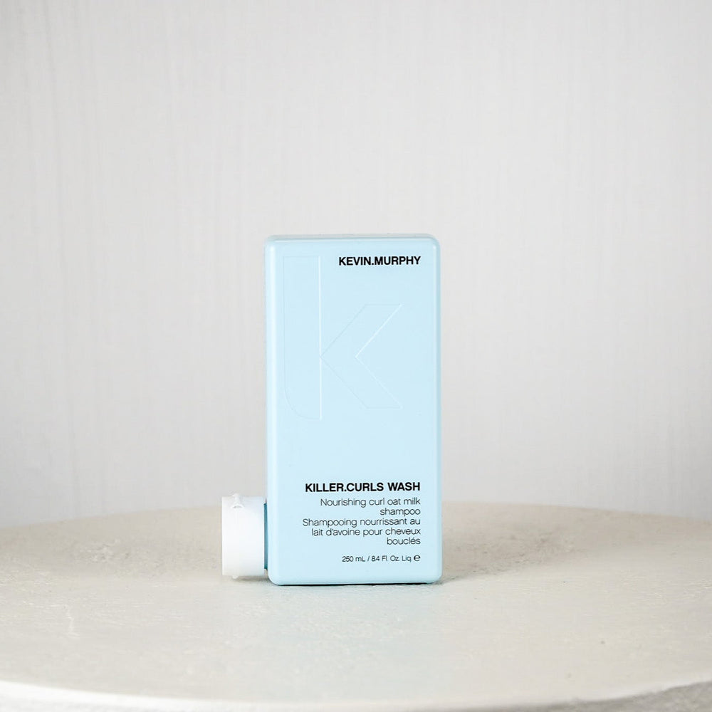 Kevin Murphy Killer Curls Wash packaging on a white surface with a light gray background