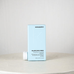 Kevin Murphy Killer Curls Wash packaging on a white surface with a light gray background