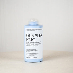 Olaplex No.4C shampoo bottle on a light gray background