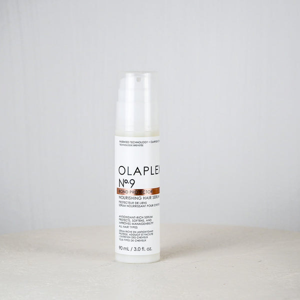 Olaplex No. 9 Nourishing Hair Serum bottle on a white background