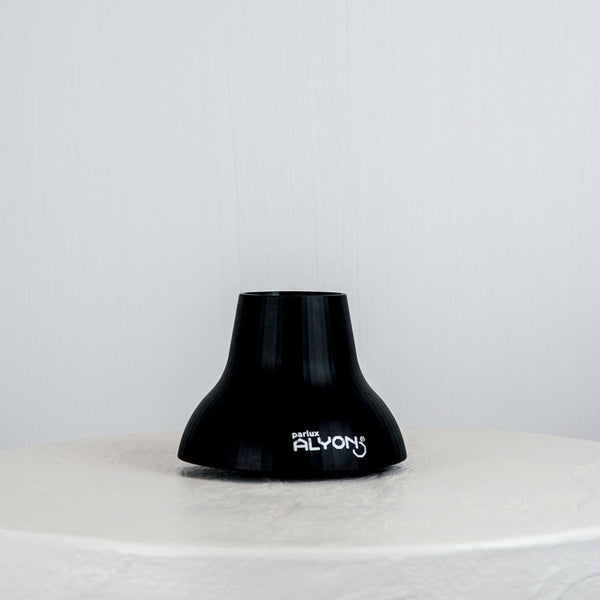 Black lampshade with 'ALYON' branding on a white surface against a light gray background