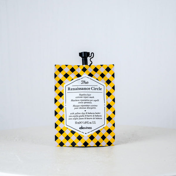 Product with yellow and black checkered packaging on a white background
