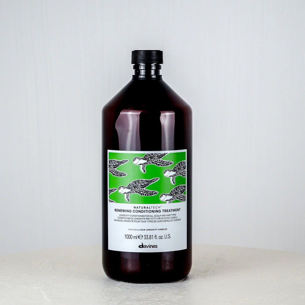 Jar of Davines hair product on a white background