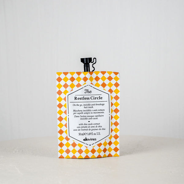 Product packaging with a checkered pattern on a white background