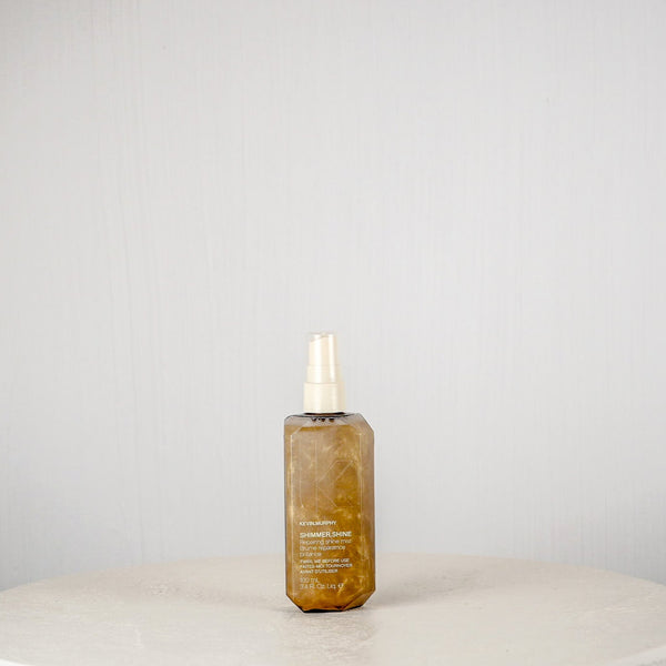 Skincare bottle on a white surface with a gray background