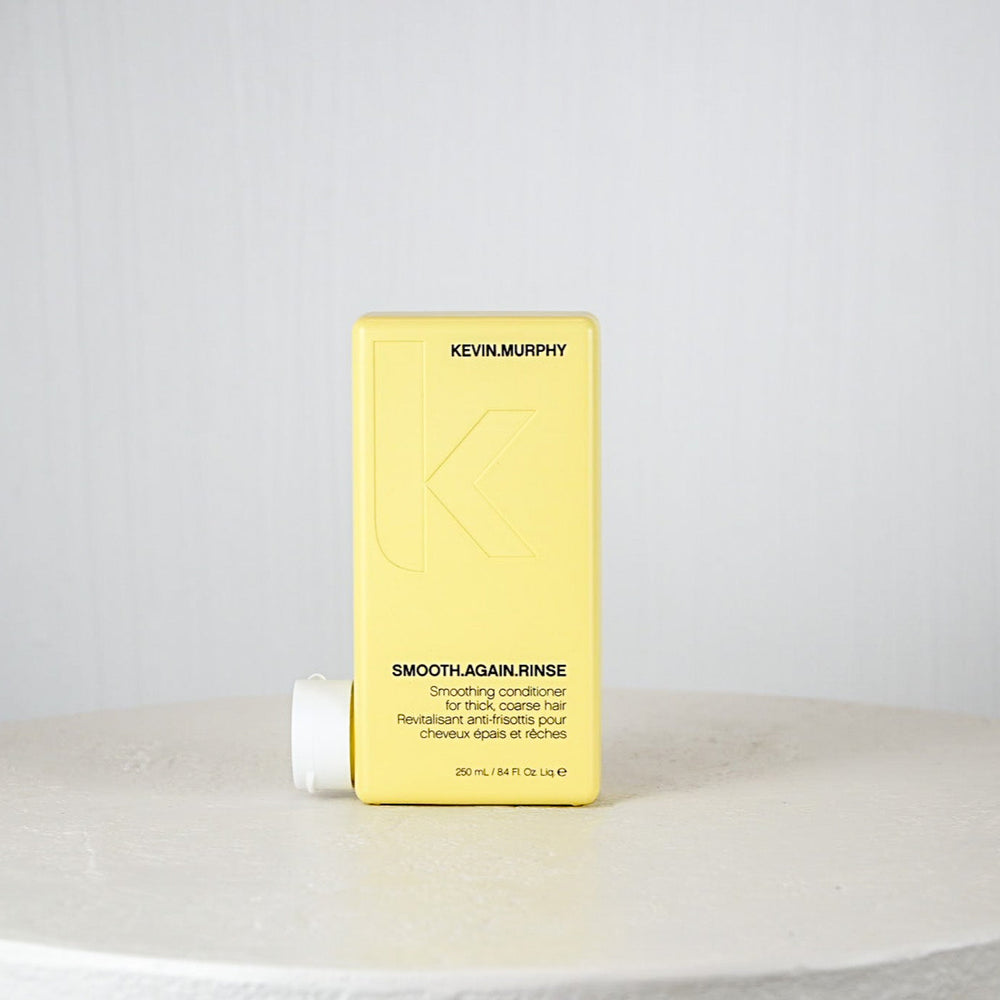 Kevin Murphy Smooth Again Rinse conditioner bottle on a white background