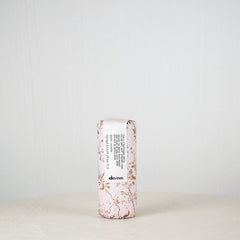 Skincare product with floral design on a white background
