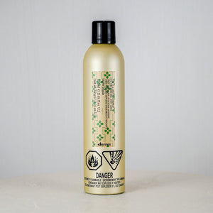 Bottle with a label on a plain background