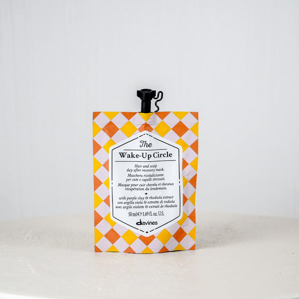 Shampoo bottle with colorful label on a white background