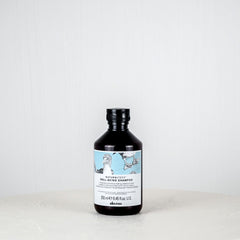 Shampoo bottle with label on a white background